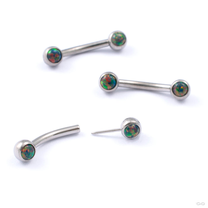 Curved Press-fit Post with Side-set Stones in Titanium from Neometal with black opal