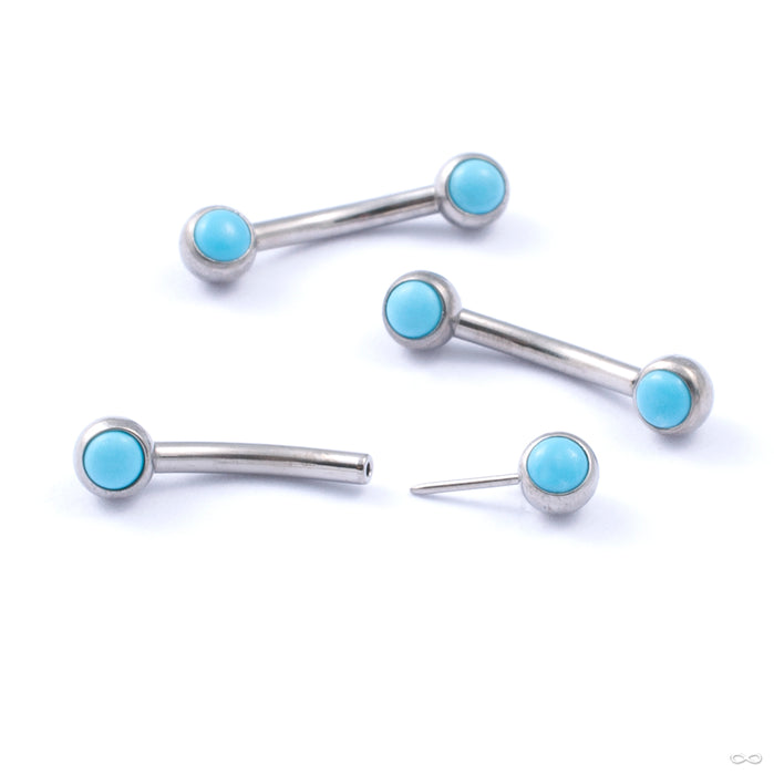 Curved Press-fit Post with Side-set Stones in Titanium from Neometal with turquoise