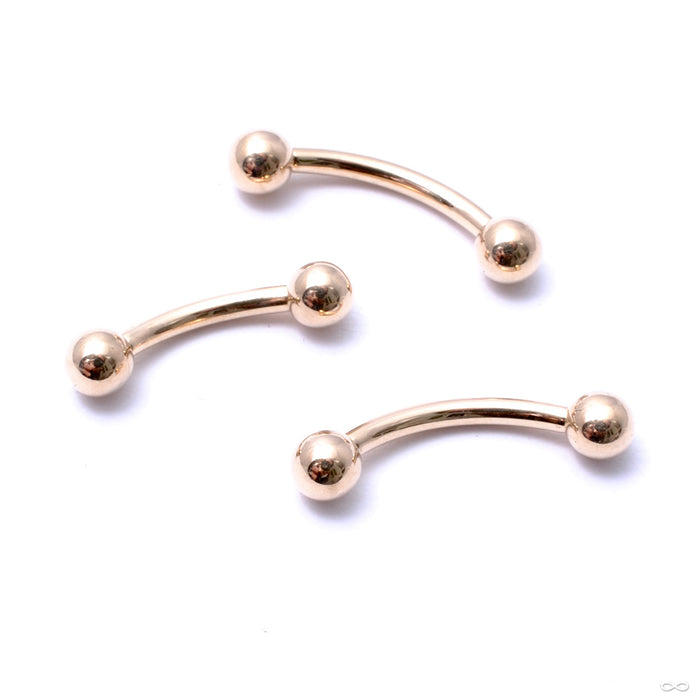 Curved Threaded Barbell with Balls in Gold from LeRoi in yellow gold