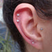 Two outer helix piercing with Prong-set Gemstone Press-fit End in Titanium from NeoMetal in 2.5mm Clear CZ