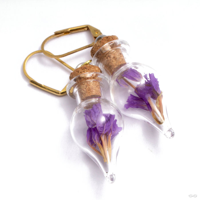 Dayak Terrarium Earrings with Flowers from Uzu Organics with purple flowers