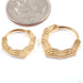 Erte Clicker from Tether Jewelry in various sizes in yellow gold