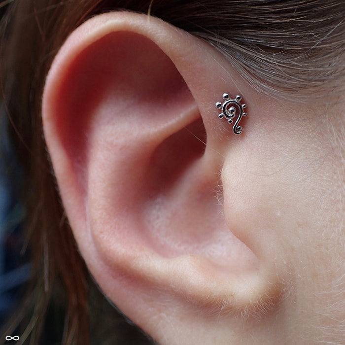 Forward helix piercing with Dots and Swirls Press-fit End in Gold from BVLA
