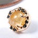 Galaxia Press-fit End in Gold from Tether Jewelry in yellow gold with rutilated quartz and black diamond
