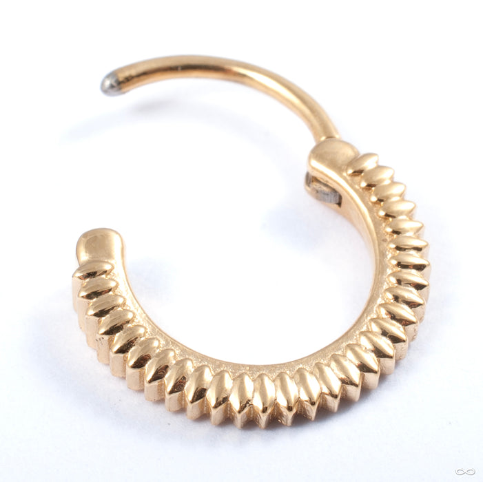 Giger Clicker from Tether Jewelry open view in yellow gold