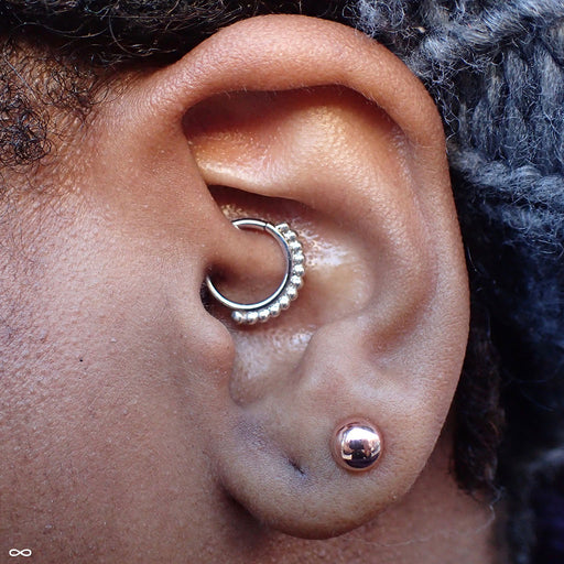 Vaughn Seam Ring in Stainless Steel from Anatometal in a daith piercing