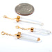 Lemurian Crystal Charm in Gold from Diablo Organics in a group