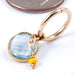 Mid-size Compulsive Collector Clicker in Gold from Pupil Hall in aquamarine with sunny yellow enamel