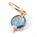 Mid-size Compulsive Collector Clicker in Gold from Pupil Hall with london blue topaz and robin blue enamel
