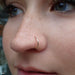 Nostril Piercing with Seam Ring in Yellow Gold in 18g from LeRoi