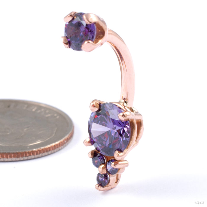 Prong-set Triple Melee Threaded Navel Curve in Gold from LeRoi in rose gold with amethyst