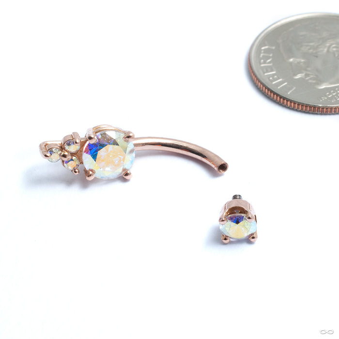 Prong-set Triple Melee Threaded Navel Curve in Gold from LeRoi with aurora borealis