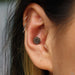 Conch piercing with Totem Press-fit End in Gold from Maya Jewelry