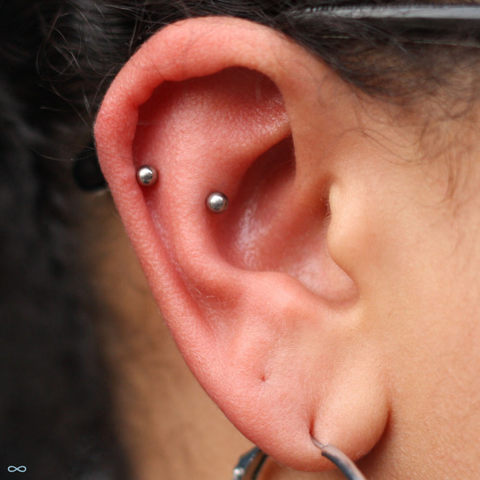 Outer Helix piercing with Ball Press-fit End in Titanium from NeoMetal in 1/8"