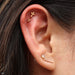 Outer Helix piercing with 6 Bead Triangle Cluster Press-fit End in Gold from BVLA