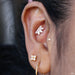 Conch Piercing with Valentina with Stone Press-fit End in Gold from Buddha Jewelry