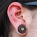 Rook piercing with Curved Press-fit Post in Titanium from NeoMetal